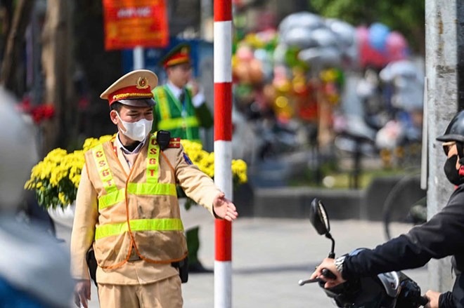 Ngoài đảm bảo trật tự an toàn giao thông, lực lượng CSGT toàn quốc còn xử lý xuyên Tết tài xế vi phạm nồng độ cồn. Ảnh: A.Nhật