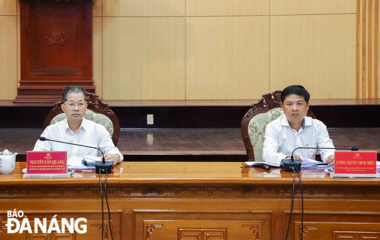 Bí thư Thành ủy Đà Nẵng Nguyễn Văn Quảng (trái) và Bí thư Tỉnh ủy Quảng Nam Lương Nguyễn Minh Triết (phải) đồng chủ trì. Ảnh: NGỌC PHÚ